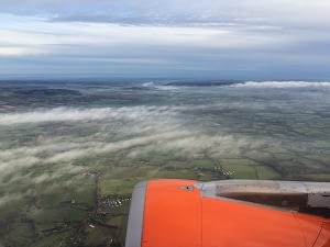 Looking out of the plane window on an easyJet plane